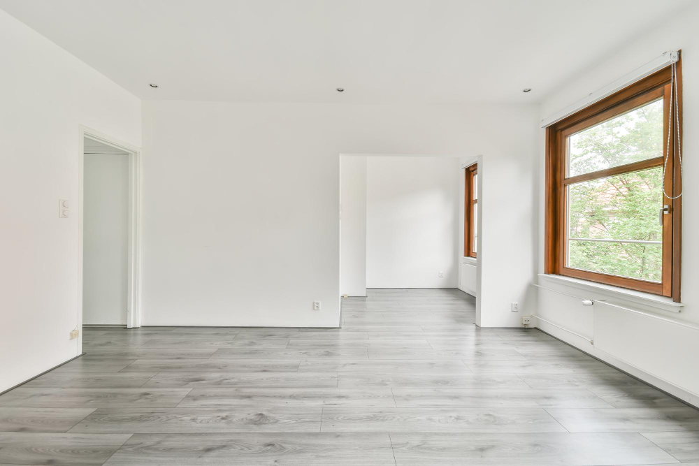 Contemporary office space with sleek hardwood flooring.